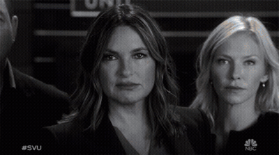 Two Women Are Standing Next To Each Other In A Black And White Photo With #Svu On The Bottom GIF