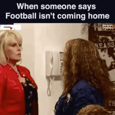 Two Women Are Standing Next To Each Other In A Room And Talking To Each Other . GIF