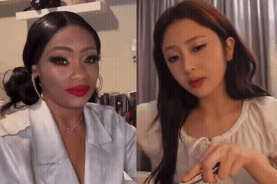 Two Women Are Standing Next To Each Other In A Room . One Of The Women Is Wearing Red Lipstick . GIF