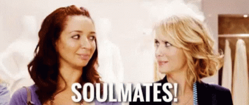 Two Women Are Standing Next To Each Other In A Store And The Words Soulmates Are Written On The Screen . GIF
