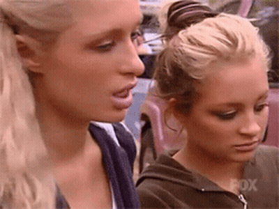Two Women Are Standing Next To Each Other With Fox Written On The Bottom Right GIF