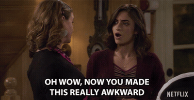 Two Women Are Standing Next To Each Other With The Words Oh Wow Now You Made This Really Awkward GIF