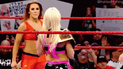 Two Women Are Wrestling In A Ring With A Sign That Says It 'S My Birthday My Only Wish Is To See . GIF