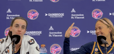 Two Women At Purple Gainbridge Fieldhouse Backdrop GIF
