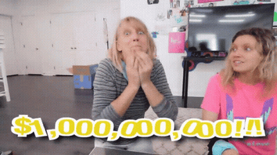 Two Women At Table One Wearing Pink I Love You T-Shirt GIF