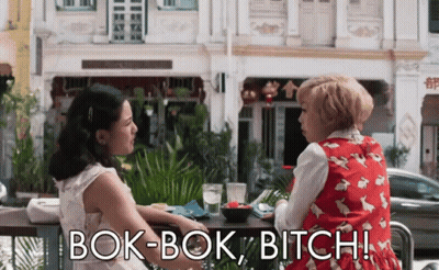 Two Women At Table Saying Bok-Bok Bitch GIF