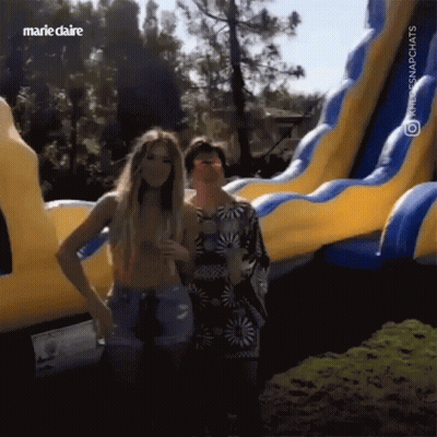 Two Women Before Inflatable Water Slide Marie Claire GIF
