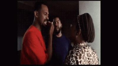 Two Women Beside Car In Parking Lot GIF