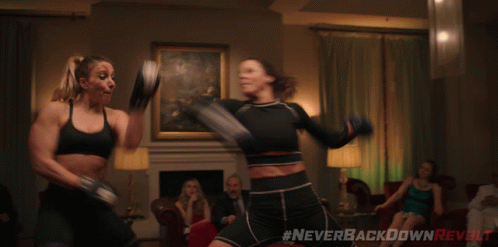 Two Women Boxing With Hashtag Neverbackdownrevolt GIF