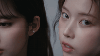 Two Women Close Up One Wearing Diamond Earring GIF