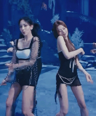 Two Women Dancing In Blue Pool GIF
