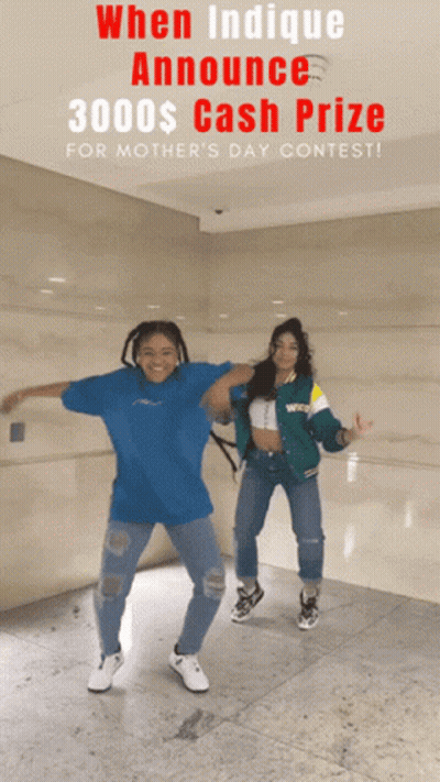 Two Women Dancing In Front Of Sign Saying When Indicque Announces $3000 Cash Prize For Mother's Day Contest GIF