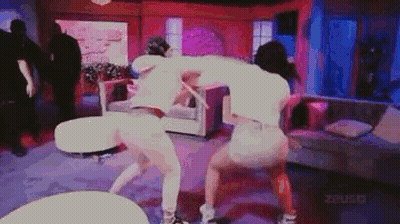Two Women Dancing in Living Room