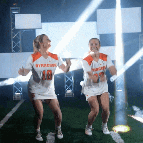 Two Women Dancing In Syracuse Jerseys GIF