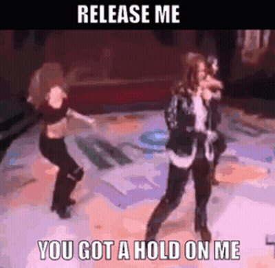 Two Women Dancing On Stage Saying Release Me You Got A Hold On Me GIF