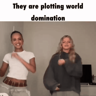 Two Women Dancing Plotting World Domination GIF