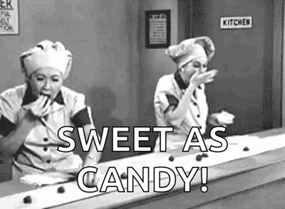 Two Women Eating Candy GIF