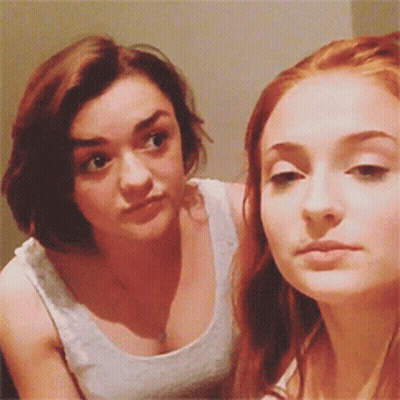 Two Women Eye Contact One White Tank Top GIF