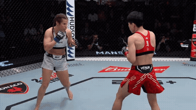 Two Women Fighting In Boxing Ring One In Venum Tank Top GIF