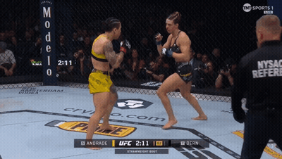 Two Women Fighting In Boxing Ring Score 2:11 GIF