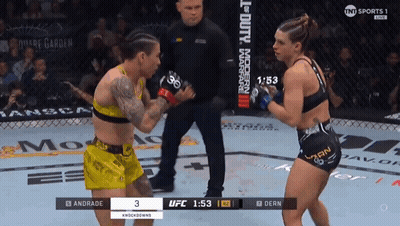 Two Women Fighting In Boxing Ring With Dern Shorts GIF