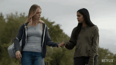 Two Women Holding Hands Netflix Logo GIF