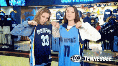 Two Women Holding Memphis Jersey GIF
