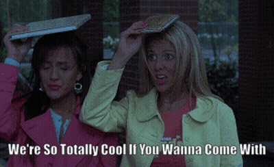 Two Women Holding Notebooks On Heads We're So Totally Cool If You Wanna Come With GIF