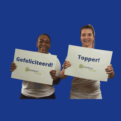 Two Women Holding Signs Saying Gefeliciteerd And Topper GIF