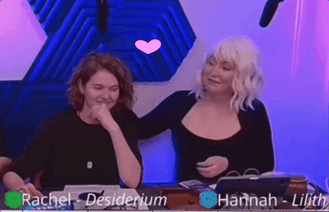Two Women Hugging Each Other With The Names Rachel Desiderium And Hannah Lilith Visible GIF