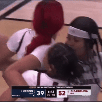 Two Women Hugging On Basketball Court GIF