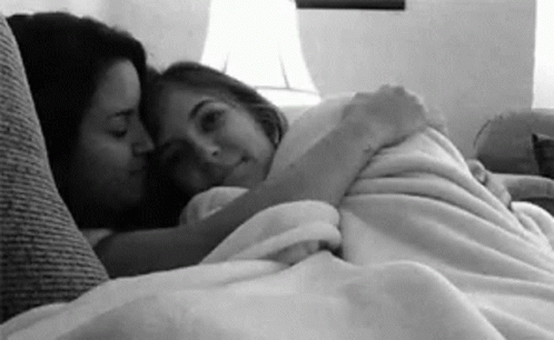 Two Women Hugging On Couch GIF