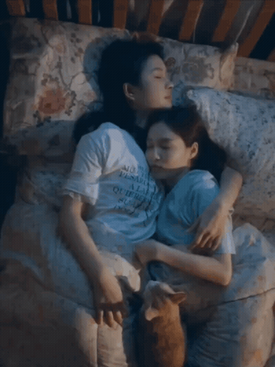 Two Women Hugging One Wearing A La Shirt GIF