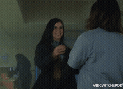 Two Women Hugging One With Jade Name Tag GIF