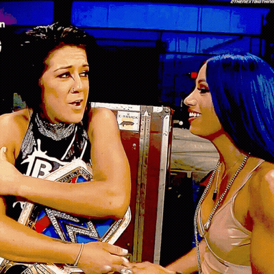 Two Women Hugging With C-Train Sticker GIF
