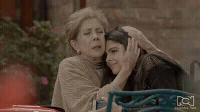Two Women Hugging With Nuestra Tele GIF