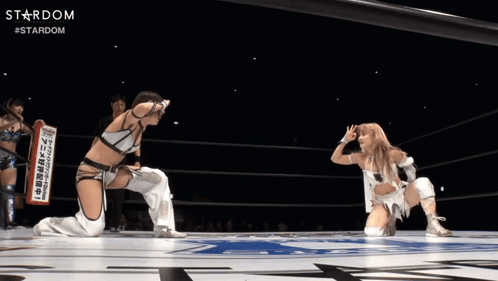 Two Women In A Wrestling Ring With The Word Stardom On The Bottom Right GIF
