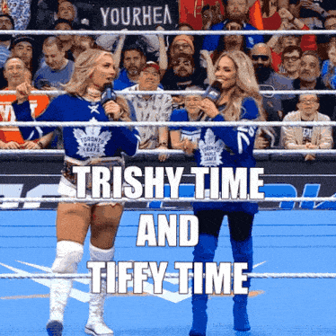 Two Women In A Wrestling Ring With The Words " Trishy Time And Tiffy Time " Above Them GIF