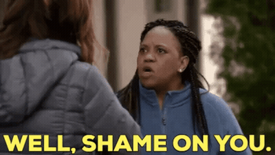 Two Women In Blue Jackets Talking GIF