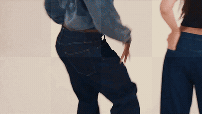 Two Women In Blue Jeans Hands In Pockets GIF
