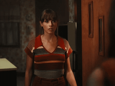 Two Women In Blue Tiled Bathroom GIF