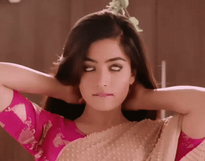 Two Women In Bras Standing Together GIF