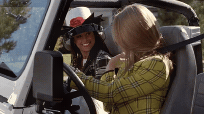 Two Women In Car One Wearing White Hat GIF