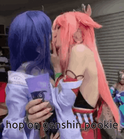 Two Women In Cosplay Are Kissing Each Other With The Words `` Hop On Genshin Pookie '' Written On The Bottom . GIF