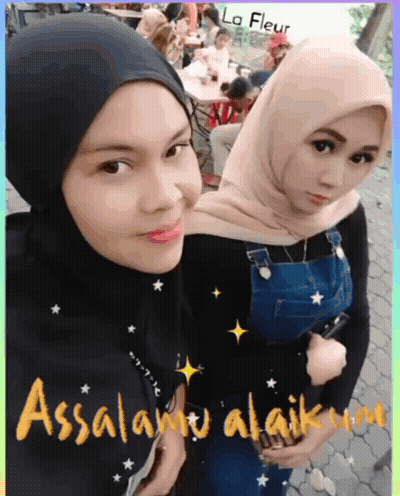 Two Women In Hijabs Posing With Assalamu Alaikum GIF