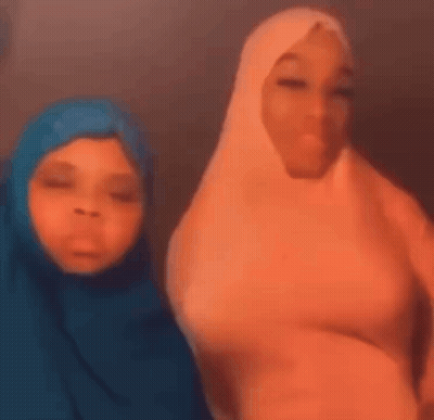 Two Women In Hijabs Smiling GIF