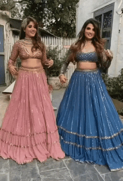Two Women In Long Skirts GIF