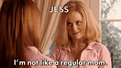 Two Women In Pink Shirts Talking GIF