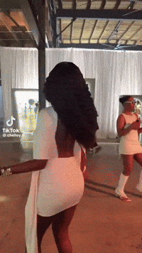 Two Women In White Dresses Dancing GIF