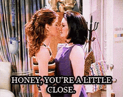 Two Women Kissing Saying Honey You're Really Close GIF